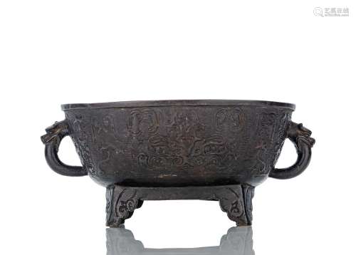 AN OVAL BRONZE VESSEL WITH CAST AND INSCRIBED INSCRIPTION