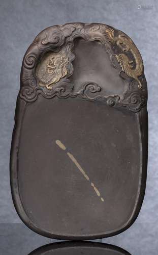 A CARVED DUAN INK STONE WITH CARVED DRAGONS