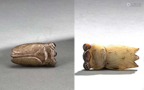 A GREEN-BROWN CARVED JADE CICADA AND A FURTHER GREEN JADE CI...