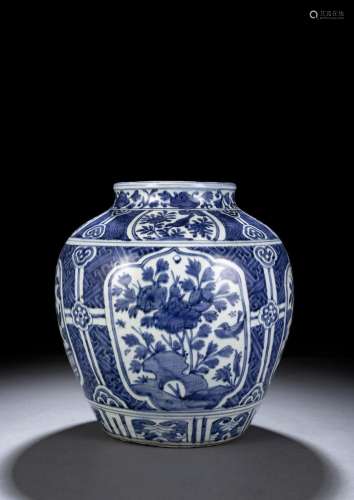 A LARGE BLUE AND WHITE FLOWER AND BIRD JAR