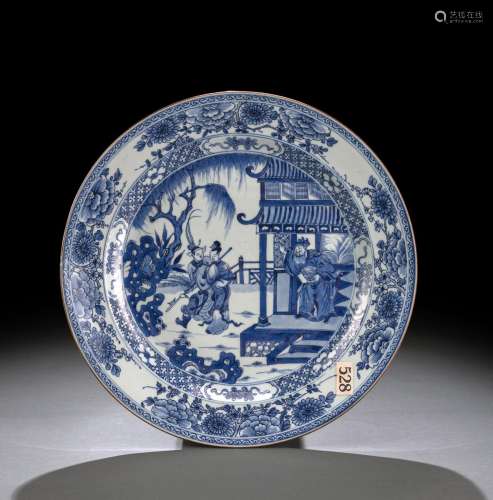 A LARGE BLUE AND WHITE PORCELAIN PLATE WITH A THEATER SCENE ...