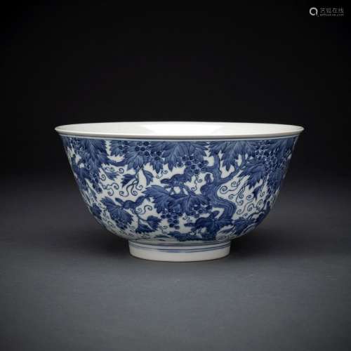 A LARGE BLUE AND WHITE SQUIRREL AND WINE PORCELAIN BOWL