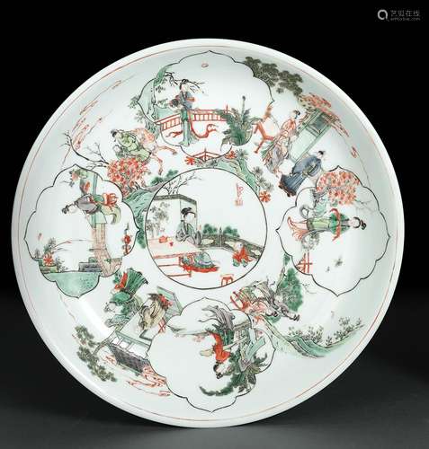 A FAMILLE VERTE PORCELAIN PLATE WITH SEVERAL SCENES OF LADIE...