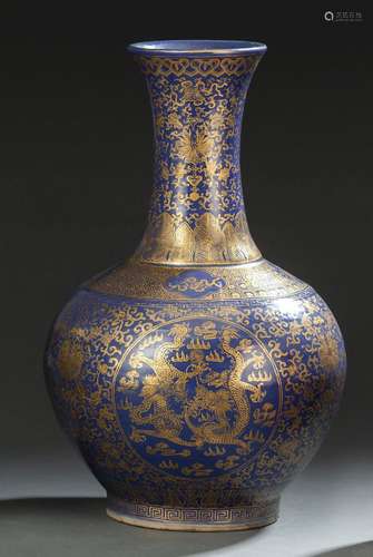 A POWDERBLUE-GROUND GILT-PANITED DRAGON AND LOTUS BOTTLE VAS...