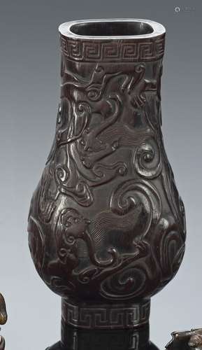 A HU-SHAPED CARVED DARK BROWN WOOD VASE WITH CHILONG