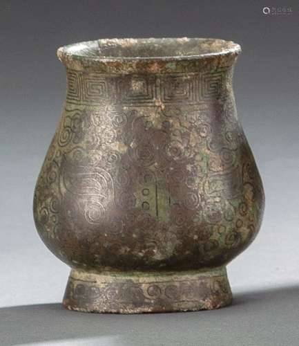 A BRONZE VASE WITH SILVER-INLAYS IN ARCHAIC STYLE