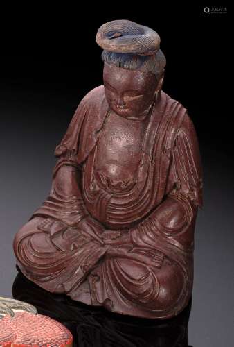 A RED-BROWN LACQUERED FIGURE OF SEATED GUANYIN