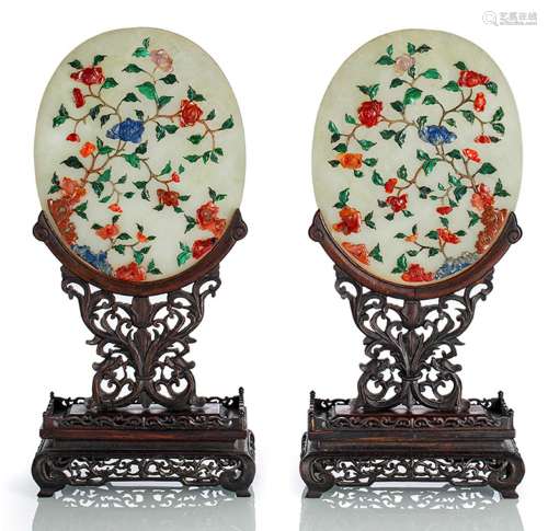 A PAIR OF STONE-INLAID JADE PANELS MOUNTED IN WOODEN STANDS ...