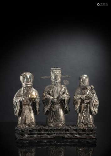 A SILVER GROUP OF THE THREE STAR GODS AND A LITTLE BOY