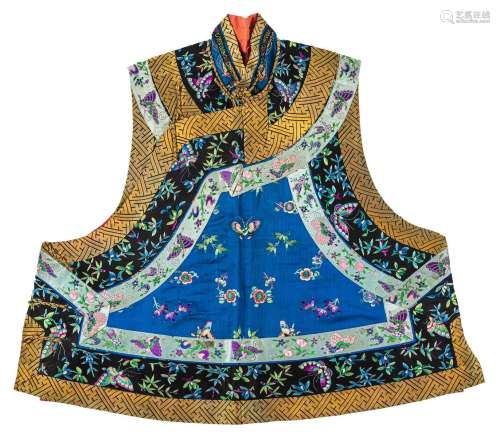 A LADY'S SHORT VEST WITH FLOWERS AND BUTTERFLIES