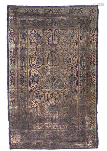 AN UNUSUAL SILK RUG