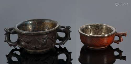 A CARVED ZITAN AND A CARVED HUANGHUALI WINE CUP WITH SILVERE...