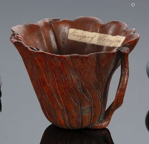 A FINE CARVED BAMBOO LOTUS SHAPED CUP