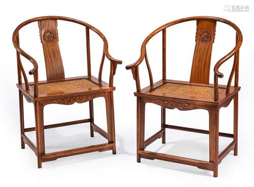 A PAIR OF HORSESHOE-BACK ARMCHAIRS WITH MATTED SEATS AND CAR...