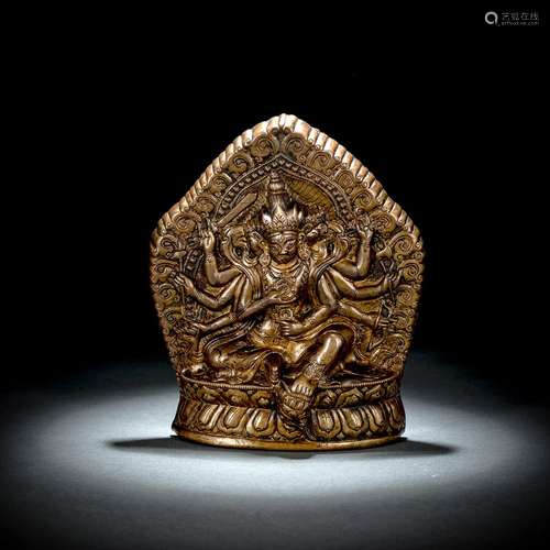 A BRONZE PLAQUE DEPICTING A TANTRIC DEITY