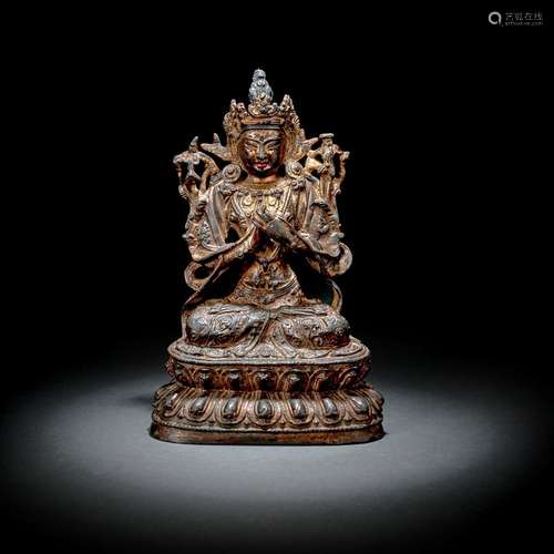 A BRONZE FIGURE OF MANJUSRI