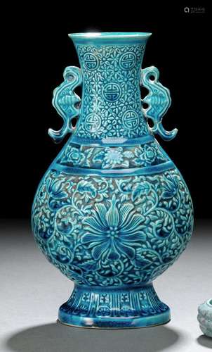 A MOLDED TURQUOISE-GLAZED BISCUIT PORCELAIN VASE