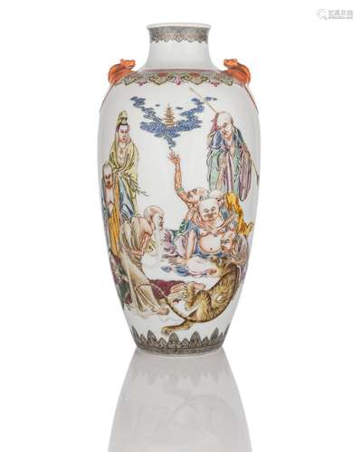 A FAMILLE ROSE 'GUANYIN AND EIGHT LUOHAN' PORCELAI...