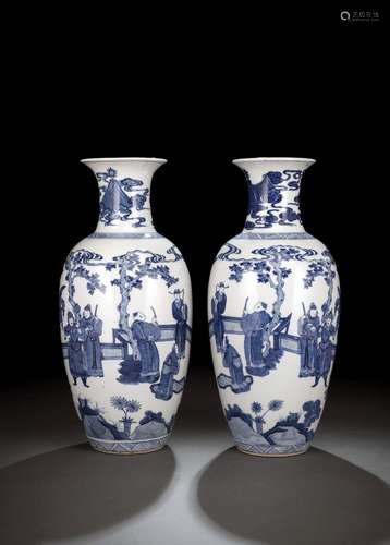 A PAIR OF BLUE AND WHITE FIGURAL PORCELAIN BALUSTER VASES