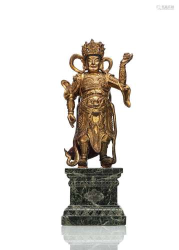 A GILT-BRONZE FIGURE OF VIRUPAKSHA MOUNTED ON A STONE PLINTH