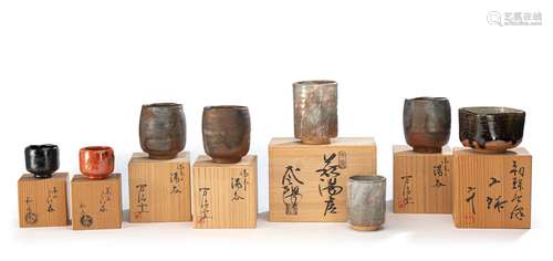 A GROUP OF EIGHT CUPS FOR TEA AND SAKE