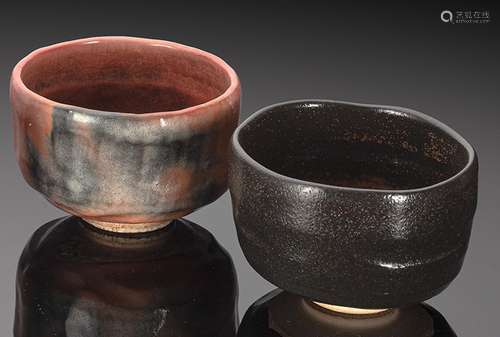 THREE RAKU CHAWAN, TWO WITH DARK-BROWN GLAZE AND ONE WITH PE...