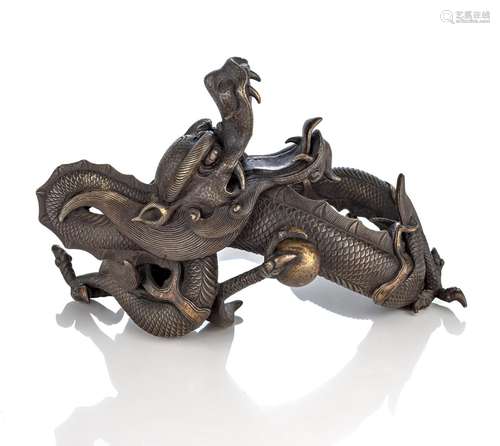 A BRONZE OKIMONO OF A CURLED DRAGON