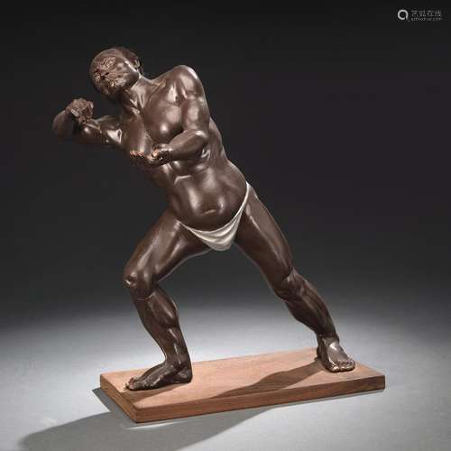 A LACQUER FIGURE OF A WRESTLER