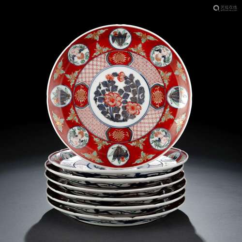 A SET OF SEVEN IRON-RED GROUND ARITA DISHES