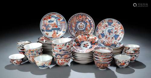 A GROUP OF IMARI TEA CUPS AND SAUCERS