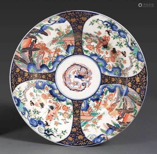 AN IMARI PORCELAIN PLATE WITH FIGURAL SCENES