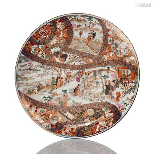 A VERY LARGE IMARI STYLE CHARGER WITH FIGURAL SCENES