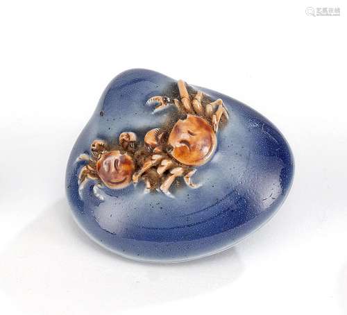 A HIRADO-PORCELAIN NETSUEK IN SHAPE OF A SHELL WITH TWO CRAB...