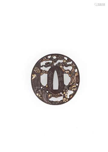 A FINE HIKONE-BORI IRON TSUBA