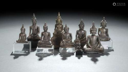 EIGHT SILVER, SILVER FOIL OR METAL FIGURES OF BUDDHA SHAKYAM...