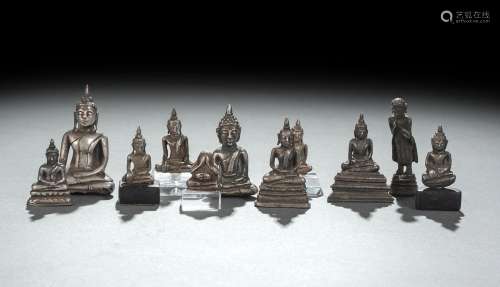 ELEVEN SILVER FOIL, SILVER OR METAL FIGURINES OF BUDDHA SHAK...