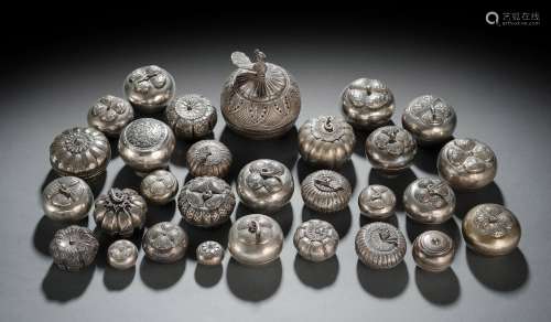 A GROUP OF FRUIT-SHAPED SILVER AND OTHER METAL BOXES