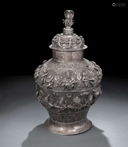 A LARGE SILVER VASE WITH COVER