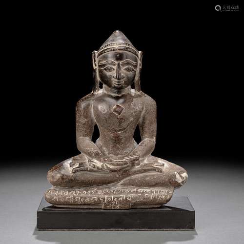 A BLACKSTONE FIGURE OF A JAIN TIRTHANKARA