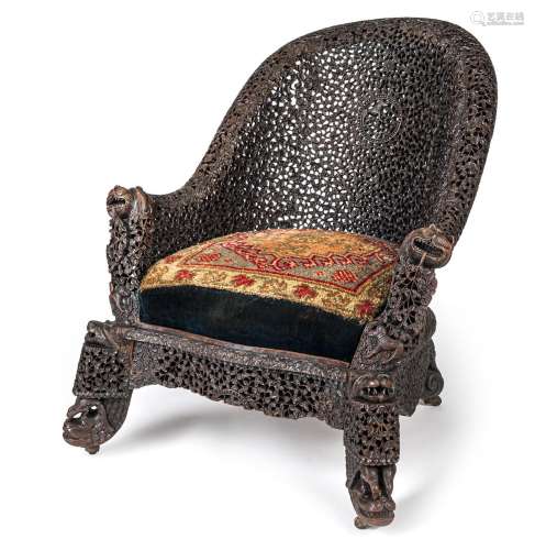 A FINE CARVED WOOD CHAIR