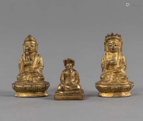THREE MINIATURE BRONZES OF A LAMA AND OTHERS