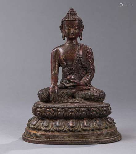 A BRONZE FIGURE OF BUDDHA SHAKYAMUNI