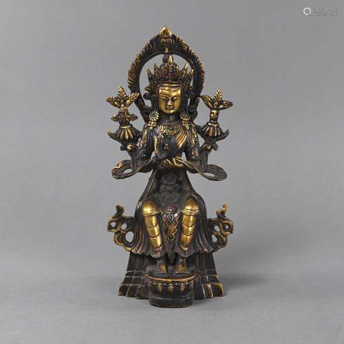 A GEMSTONE-INLAID BRONZE FIGURE OF MAITREYA