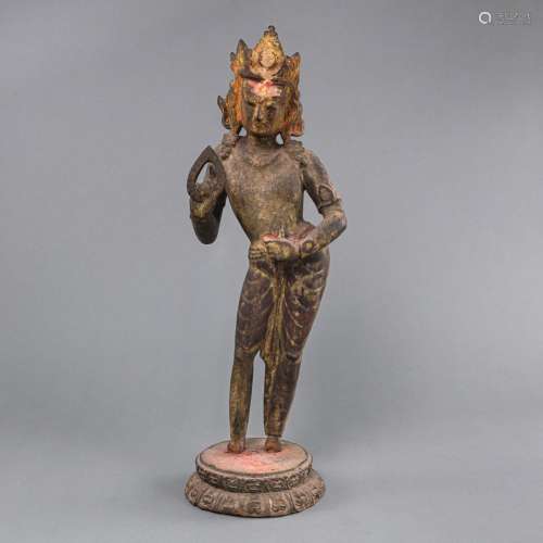 A WOOD FIGURE OF THE STANDING BODHISATTVA WITH REMNANTS OF C...