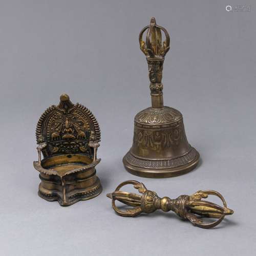 A VAJRA WITH GHANTA AND AN OIL LAMP
