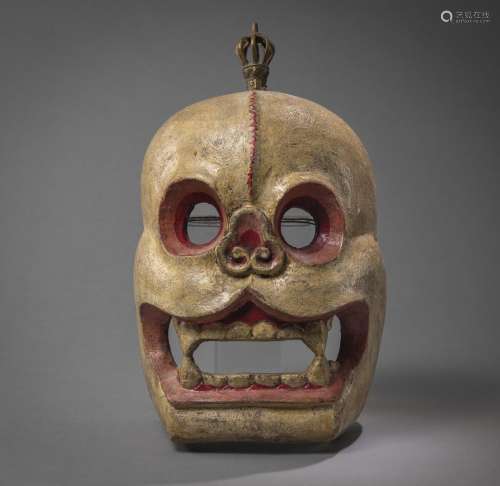 A WOOD DEMON MASK WITH VAJRA TOP