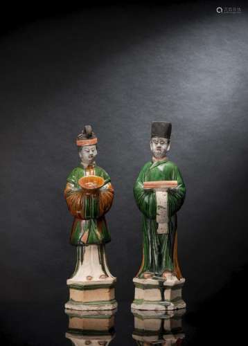 A LARGE PAIR OF SANCAI-GLAZED POTTERY COURT FIGURES OF A MAL...