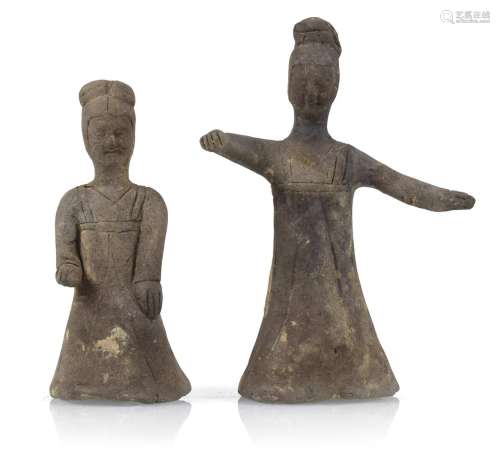 A POTTERY FIGURE OF A DANCING LADY AND A KNEELING FEMALE MUS...