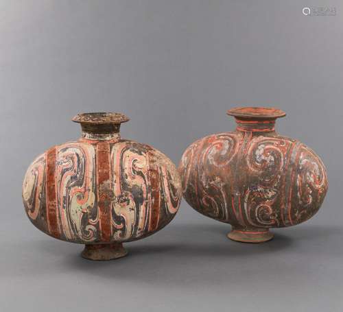 TWO COCOON-SHAPED GREY POTTERY VESSELS WITH COLD PAINTED DEC...