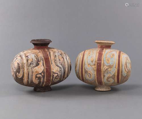 TWO COLD PAINTED COCOON-SHAPED POTTERY URNS